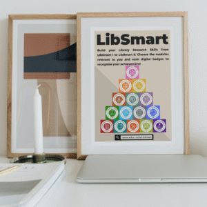 Picture of LibSmart digital badges in a wooden picture frame leaning against a wall