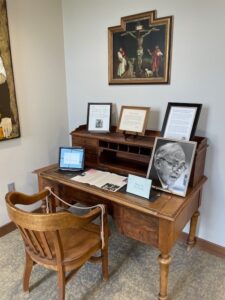 Desk with memorabilia and artwork