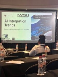 Looking at a presentation about AI in a conference session