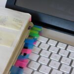 A notebook with note stickers 