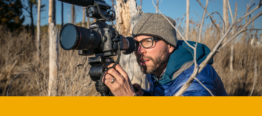 Michael Snyder photographed with his camera.