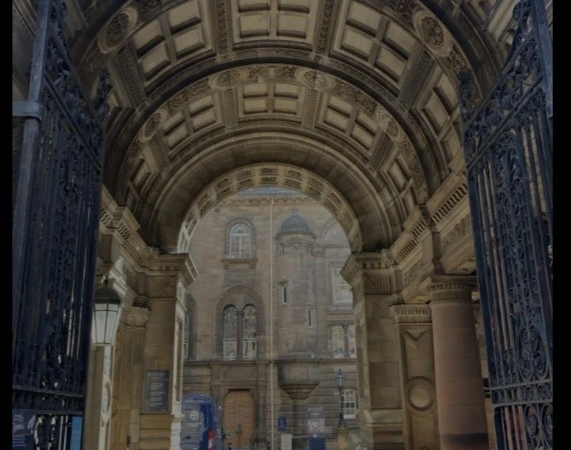 An image of a vaulted ceiling in a University