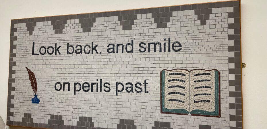 Tiled piece sayin g"Look back and smile on perils past" taken at Abbotsford, home of Walter Scott