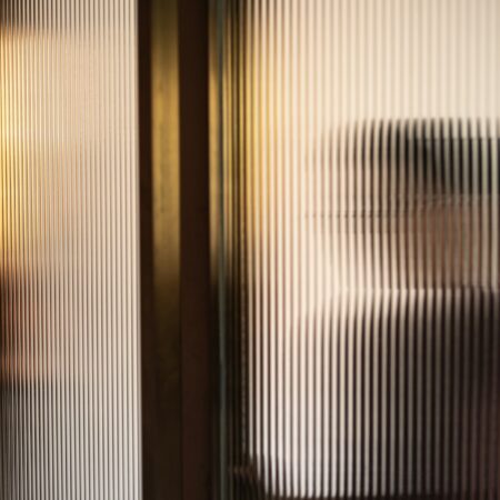 A person seen through privacy glass, unclear, they can't see in