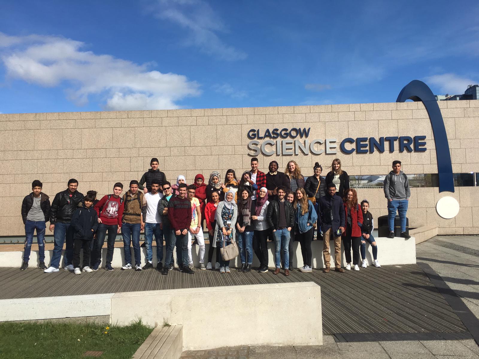 A group of students outside the Glasgow Science Centre