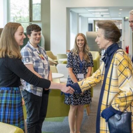 Her Royal Highness (HRH) The Princess Royal shaking hands with Vilte during the opening of the Nucleus building