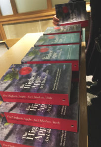 Books on a table from a different angle