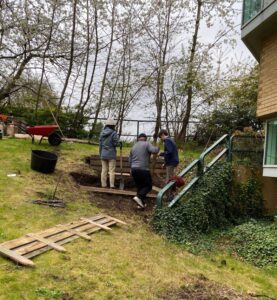 Students building a raised bed