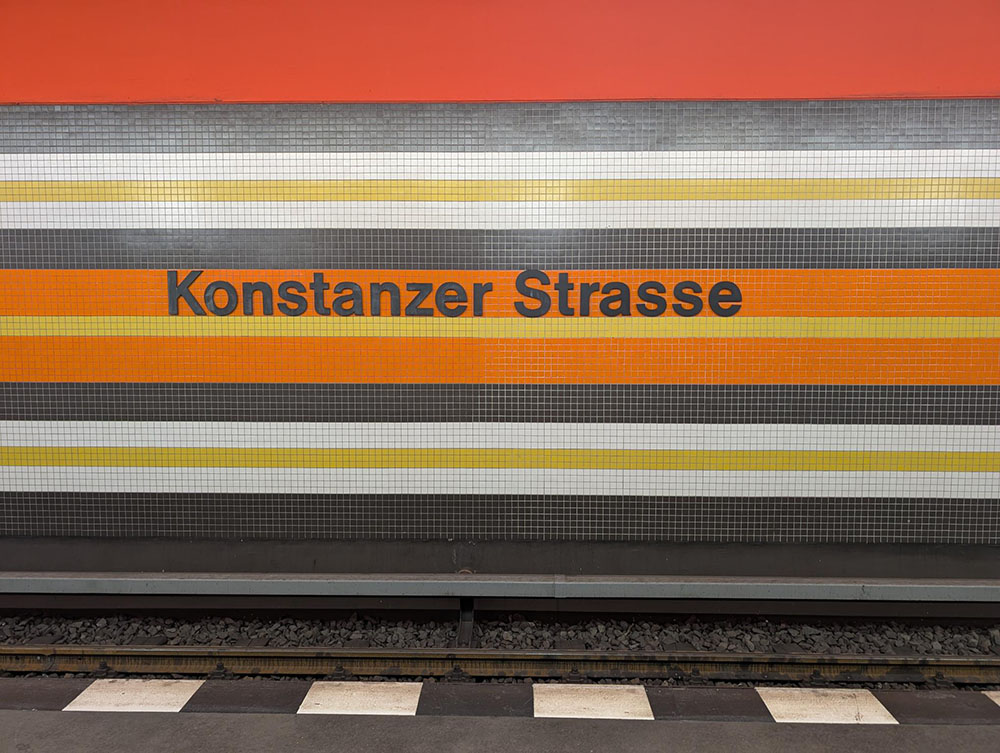 View of decorative signage at the Konstanzer Straße underground station in Berlin