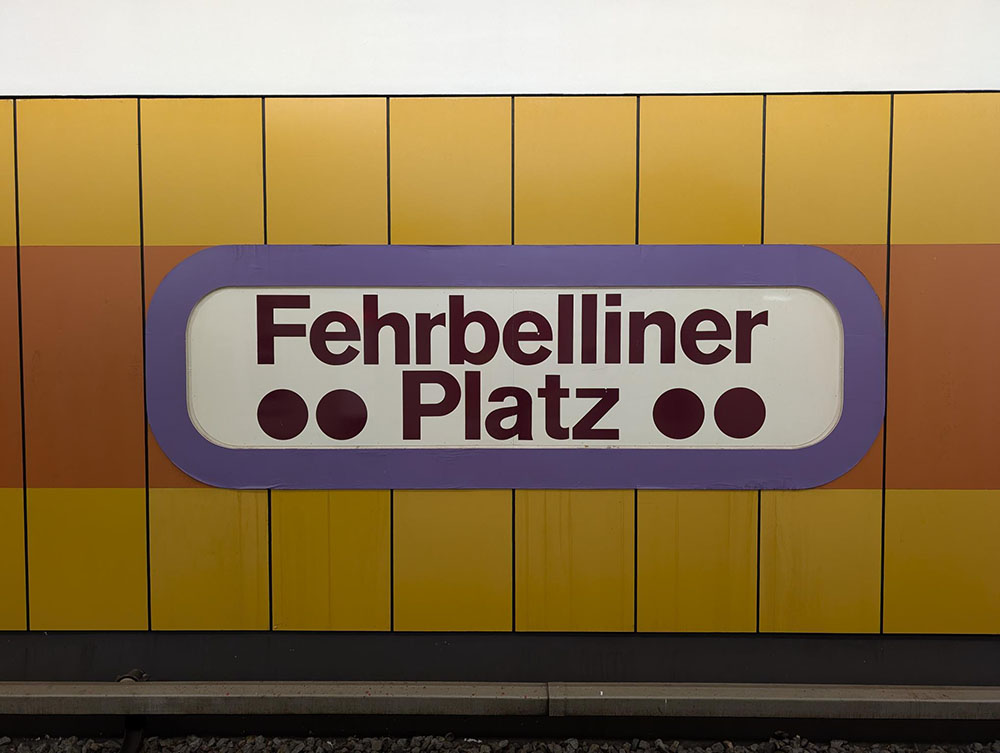 View of decorative signage at Fehrbelliner Platz underground station in Berlin