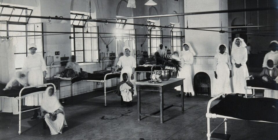 Credit: Lady Hardinge Medical College and Hospital, Delhi: nurses on a ward. Photograph, 1921. Credit: Wellcome Collection. Attribution 4.0 International (CC BY 4.0)