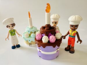 Photo of lego cake and lego bakers