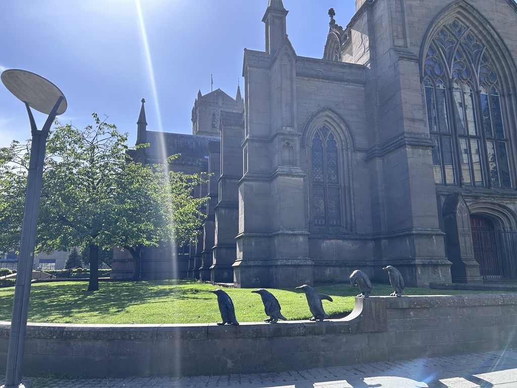 The Matching of Penguins Statue