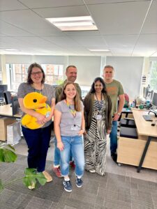 Group photo (Catherine, Laura, Andy, Nandita and Andrew) standing in Argyle House office