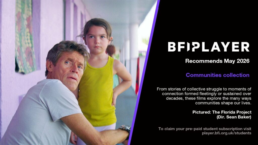 A man and a girl turn to look at the camera in a still photograph from film "The Florida Project"