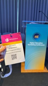 Ari Badlishah's conference participant lanyard pictured next to podium