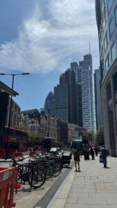 View from outside conference venue - towering buildings in London including the Gherkin