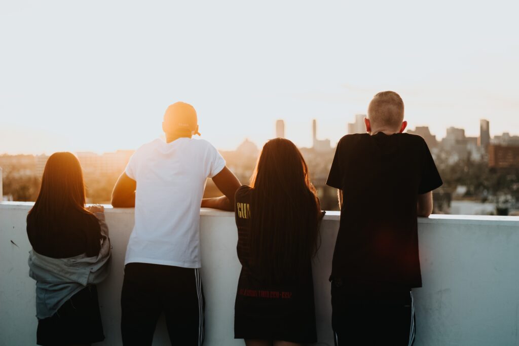 Youth looking over a balcony