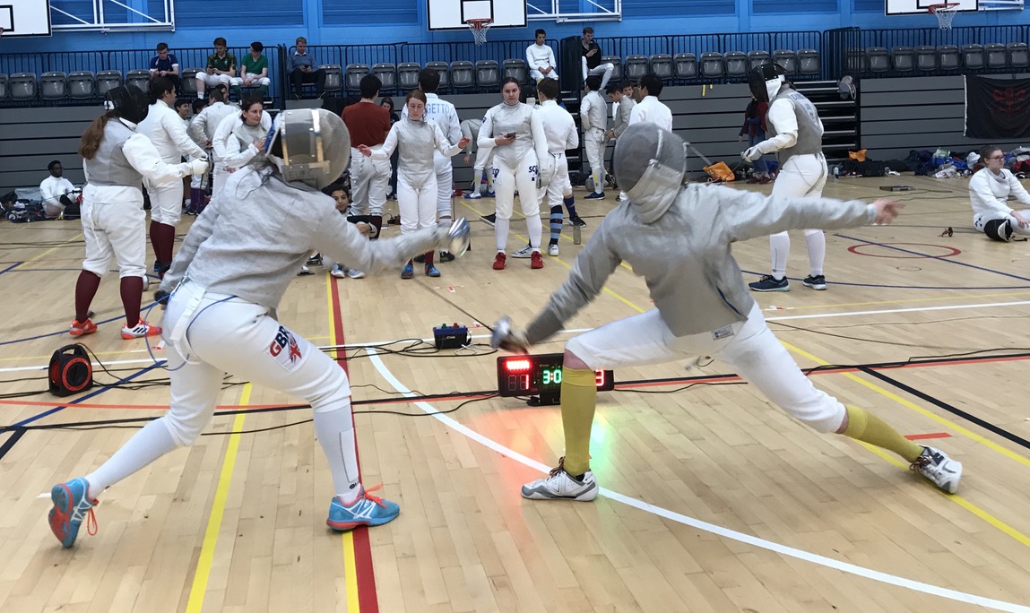 Katherine Dodds (left) in a fencing competition