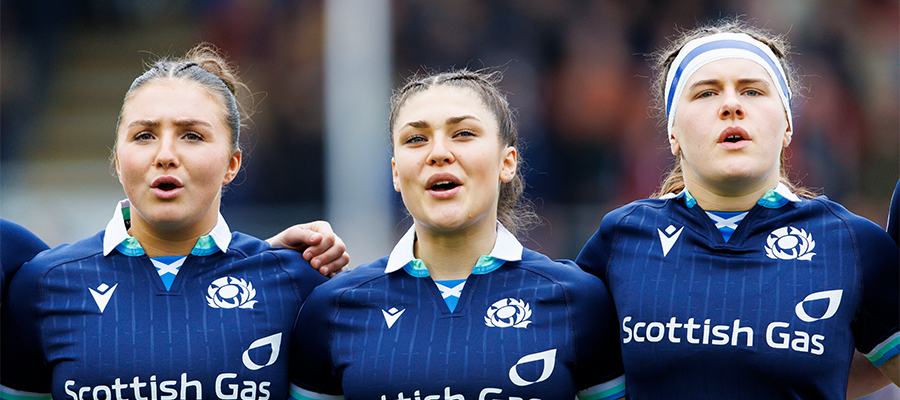 Rugby players singing national anthem