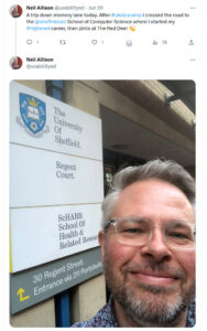 Screengab of twitter feed. Photo of Neil Allison outide a Sheffield University building. Text in caption.