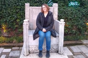 Robin on a stone chair in Venice