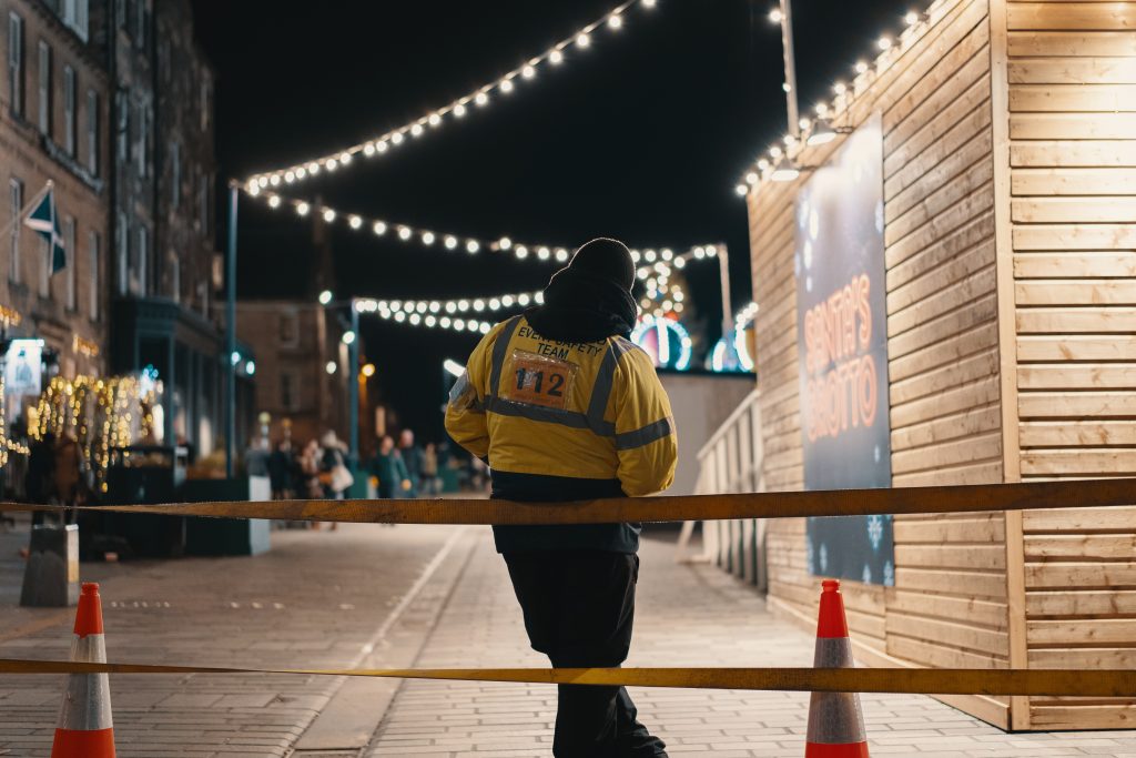 man working at christmas markets