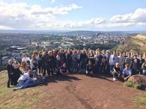 First year students all climb arthurs seat.