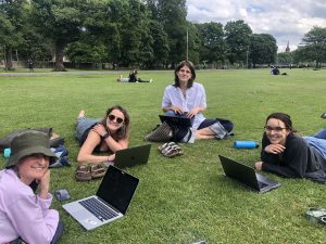PG Geosciences students studying on the grass