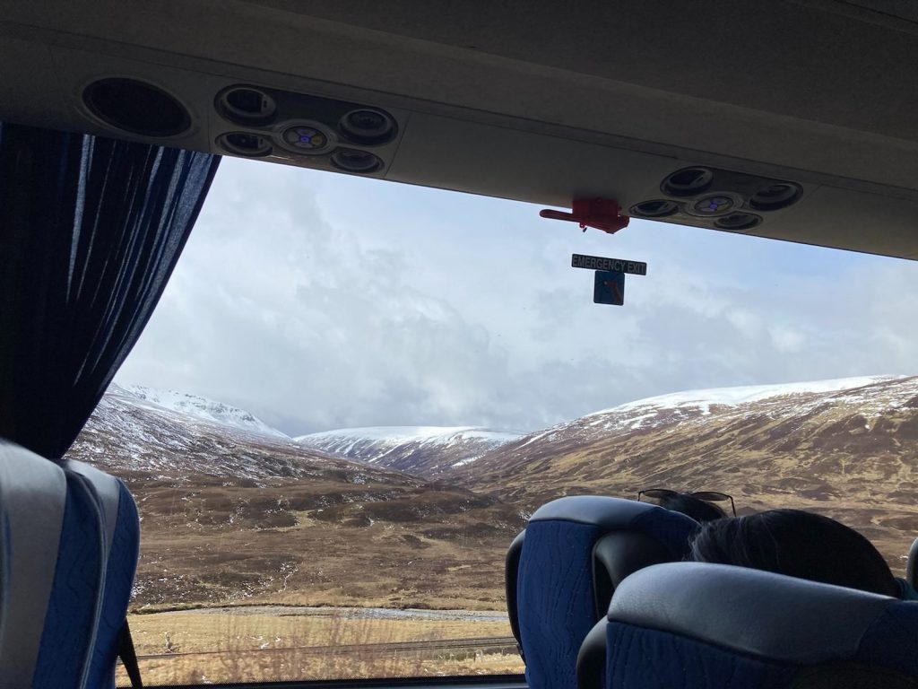 A view with snow mountain from the coach