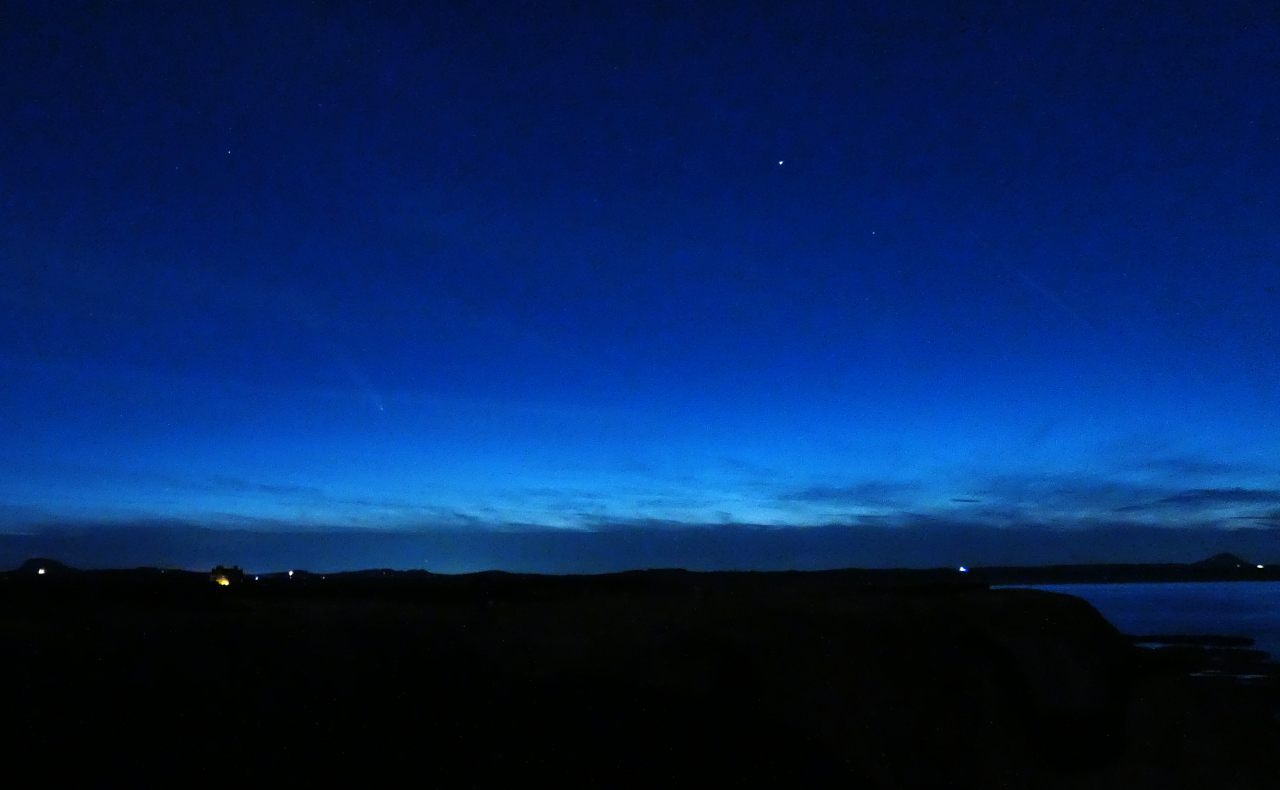 Twilight sky with a hard-to-see comet in it