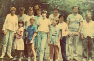 A young Helen, her mum and sister taking adults with learning difficulties on a holiday to Cornwall
