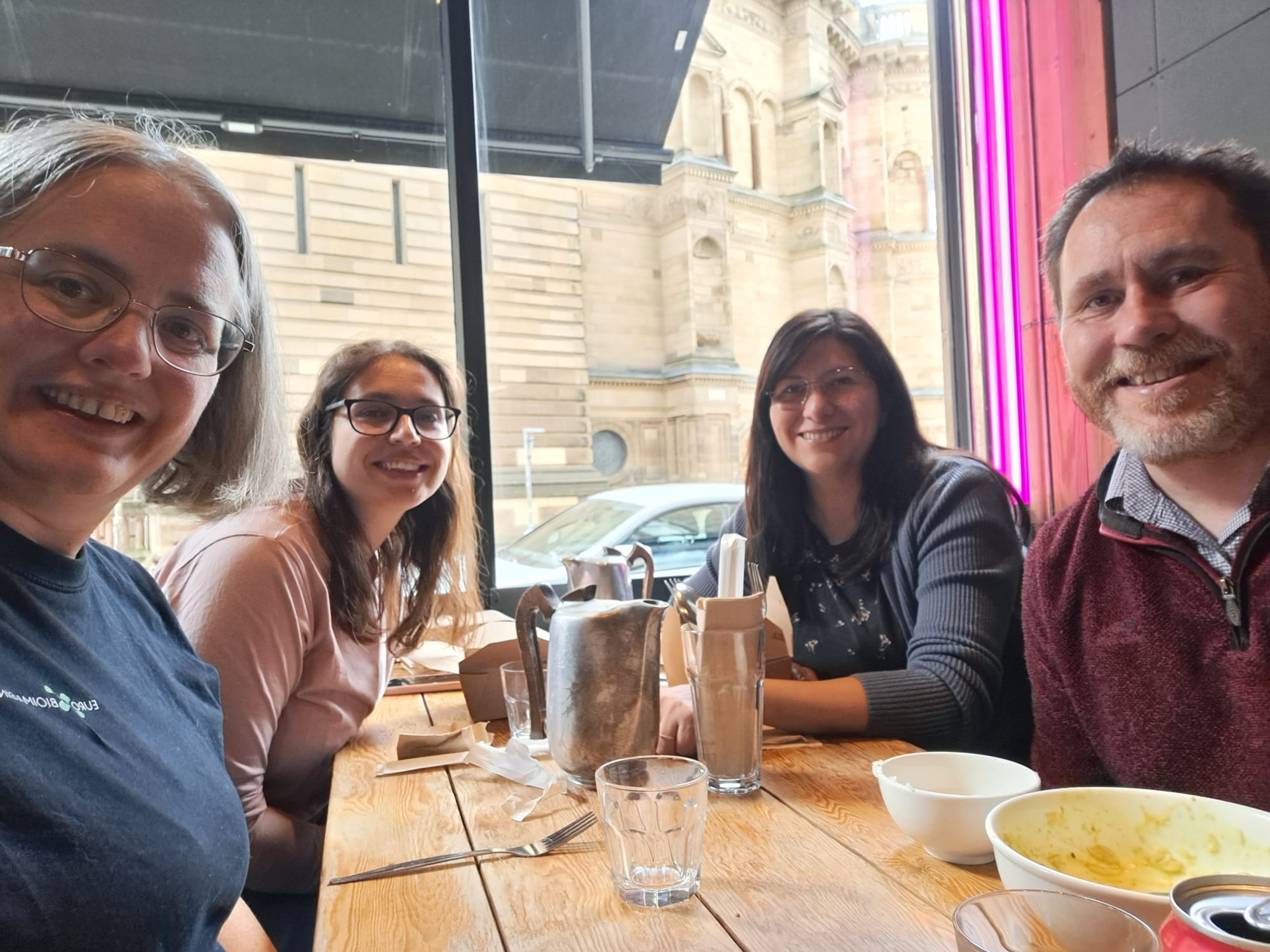 Four people at a table