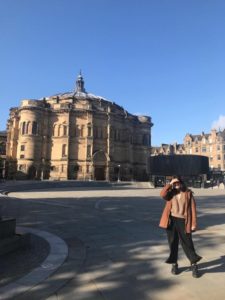 Amanda standing in front of McEwan Hall