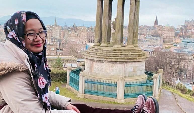 Ari with Edinburgh city in the background.