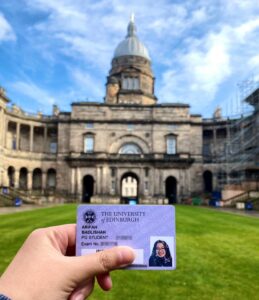 University of Edinburgh student card in front of New College