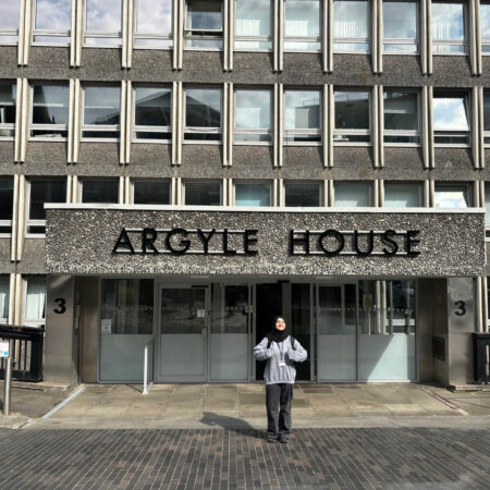 Maryam stood outside of Argyle House.