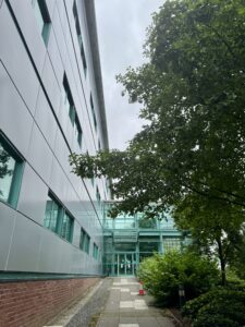 Photo of glass entrance to Christina Miller Building