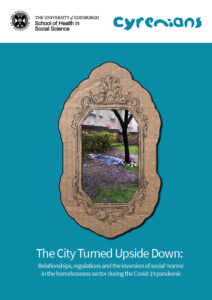 Blue report cover which says Cyrenians and has an image of a tree with a mat under it in a cardboard frame, below says The City Turned Upside Down