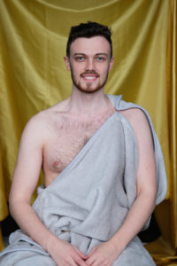 Sam Bresland wearing a toga smiling