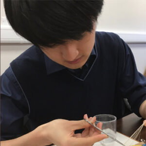 Jiaming Lui practicing surgical skills