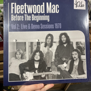 Cassidy's hand holding a Fleetwood Mac record