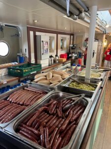 Food being served in a buffet style setup