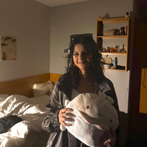 Kavya pictured holding plushy toy