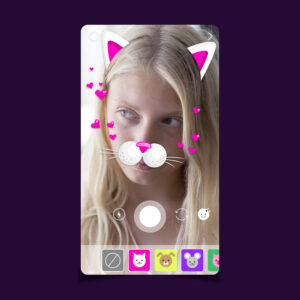 A girl using an AR cat sticker.