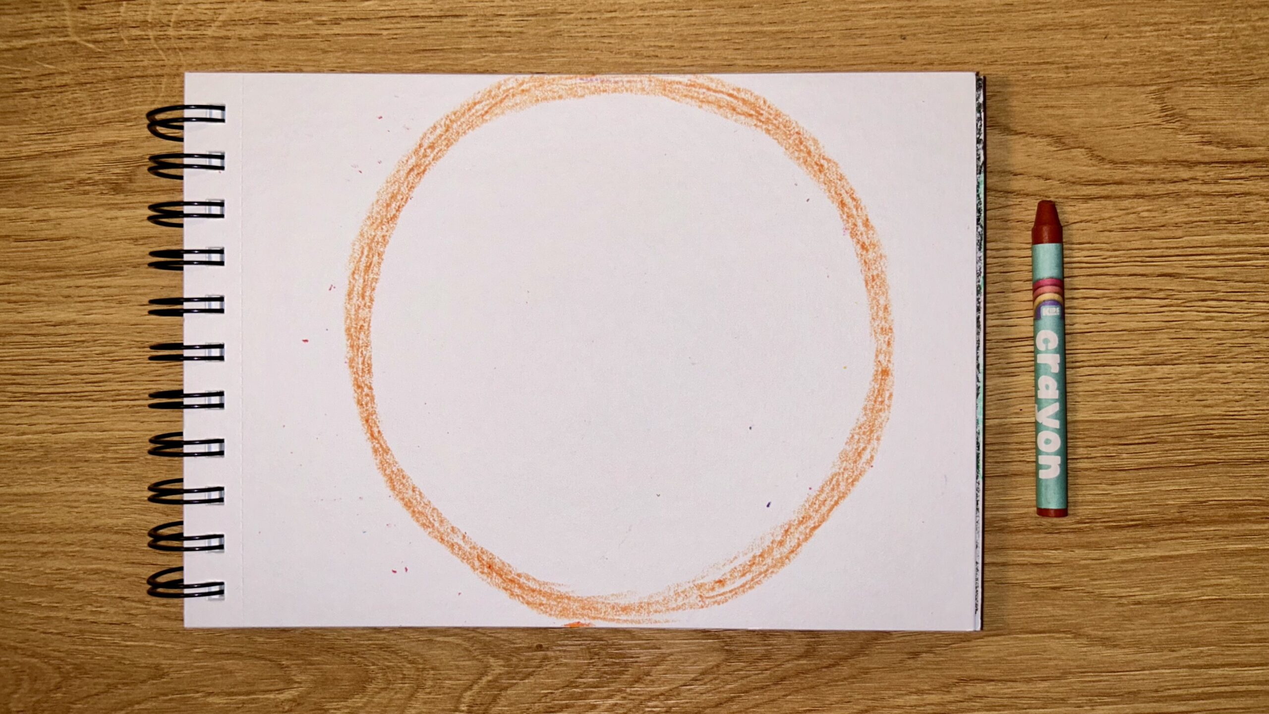 A circle in the middle of the paper.