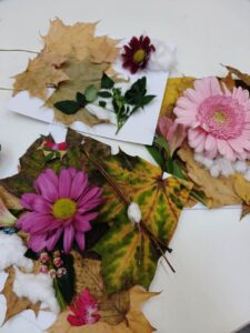 This picture shows three learners' work with flowers and leaves
