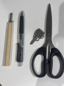 Carving tool, pen, key, scissors