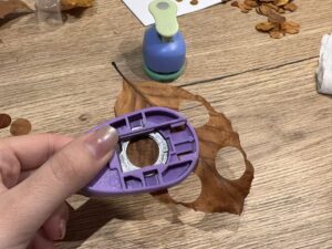 The process of using a rounding tool to press leaves into a round shape.