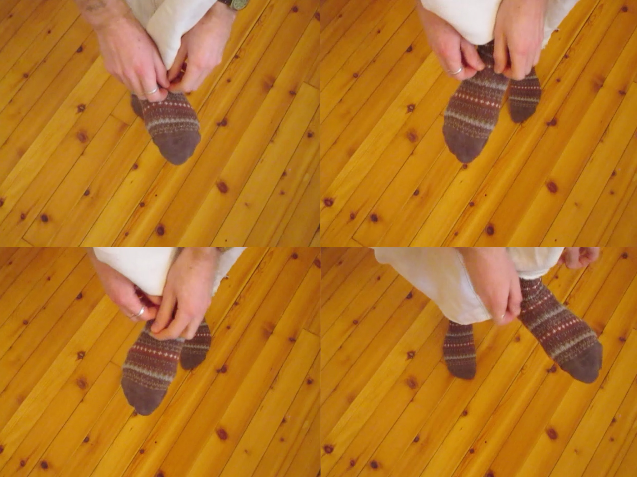 "Tying Shoes" by Preston Taylor is licensed under CC BY-SA 4.0. Four static images with identical compositions document a figure acting out the act of tying their shoes at different moments during the action. The camera is tilted down, showing a wood floor background that takes up the entire background.